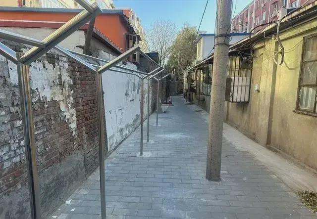 乱建居民想提升小区环境的愿望实现了凯发k8网站拆除700平方米私搭(图6)