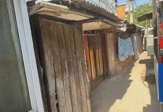 乱建居民想提升小区环境的愿望实现了凯发k8网站拆除700平方米私搭(图8)